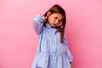 Little caucasian girl isolated on pink background  suffering neck pain due to sedentary lifestyle.