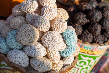 Pumice. Selective focus. Colorful pumice stone on a street market in Egypt.