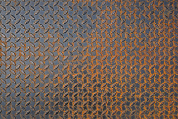 Pattern of old metal diamond plate, Surface of black steel floor non-skid with rusted, Texture background