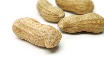 Dried peanuts, Monkey nuts, Groundnuts in shell, Isolated on white background close up