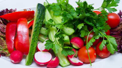 Onions, radishes, peppers, cabbage, parsley. Healthy vegetarian meals. Healthy vitamins and light foods.