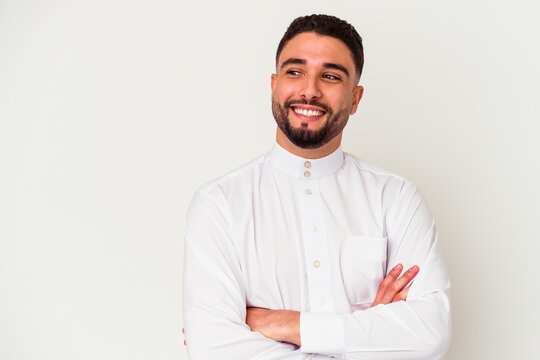 Young arab man wearing typical arab clothes isolated on white background