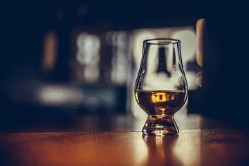 Fotobehang Close up shot a Glencairn whisky glass © bizoo_n