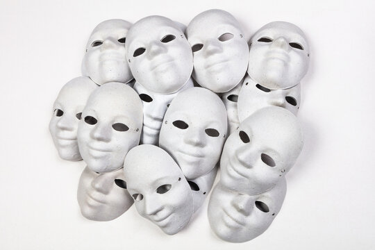papier mache masks on white background