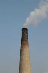 Toxic smoke emerges from a brick kiln in Lahore. There are about 20,000 kilns in Pakistan, which...