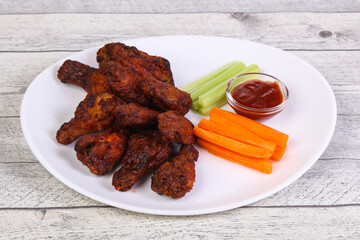 Chicken wings bbq with celery and carrot