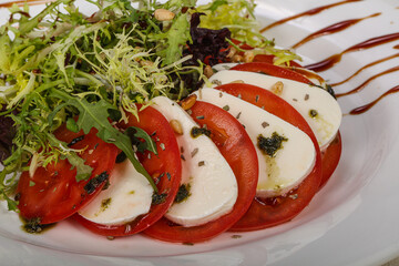 Traditional Italian Caprese salad with mozarela