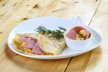 Pancake with ham and cheese
