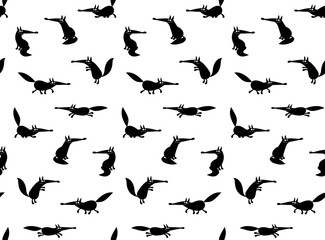 Seamless pattern with silhouettes of funny cartoon foxes