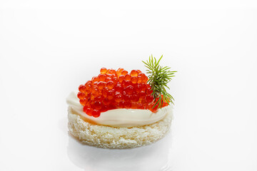 Red caviar on a white background. Isolate. Healthy food concept.