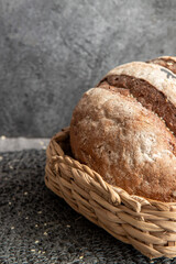 Bread in basket on marbled background