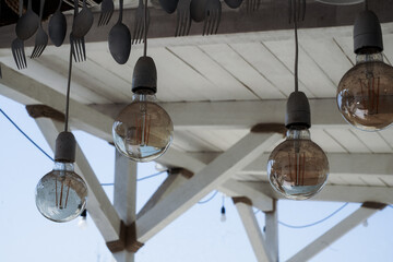 Beach bar. Vintage light bulbs in a beach bar.