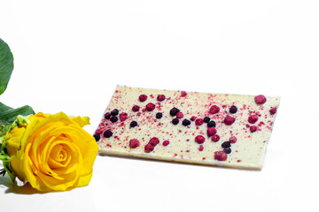 Chocolate bar with fruits on a white background. Gift concept. Isolate.