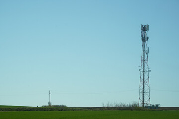 antena. scaffolding with antennas on a blue background.
