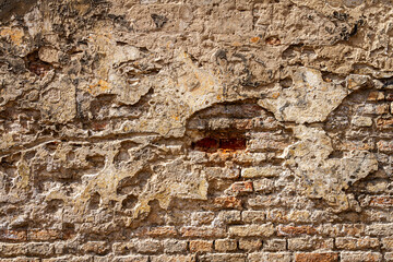 Old brick and plaster wall texture background