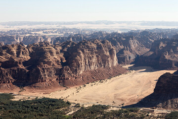 Fototapeta na wymiar Typical landscape with eroded mountains in the desert oasis of Al Ula in Saudi Arabia