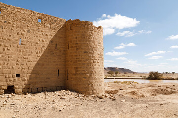 Ruins from a stone Brick Castle near Tabuk City. It was one of the major stations for the Shamiite pilgrim, Saudi Arabia - 427439010