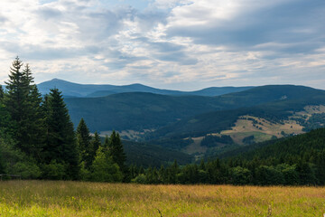 Krkonose mountains with highest Snezka hill from view point Nad Rychorskym krizem in Czech republic