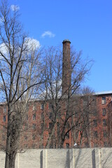 Nevskaya manufactory on the Oktyabrskaya embankment in St. Petersburg the day before the fire, pipes, towers and red brick walls