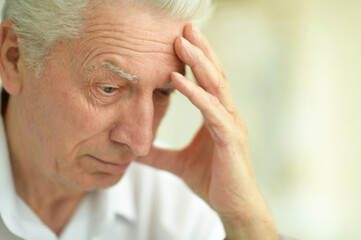 Fototapeta premium portrait of sad thinking senior man