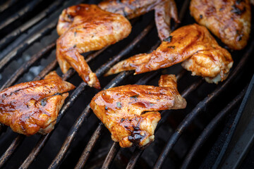 glazed bbq chicken wings on the grill