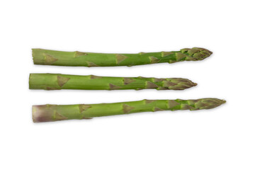 Three fresh healthy green asparagus isolated on a white background with a soft shadow. Top view.