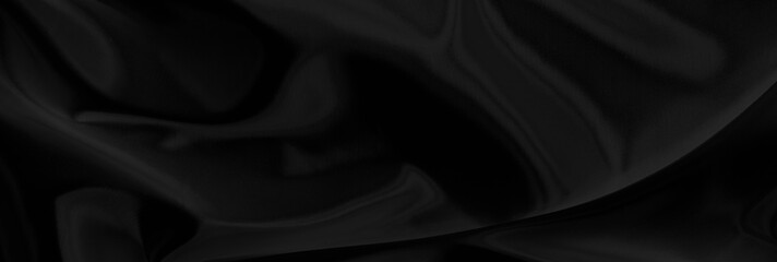 Black gray satin dark fabric texture luxurious shiny that is abstract silk cloth panorama background with patterns soft waves blur beautiful.