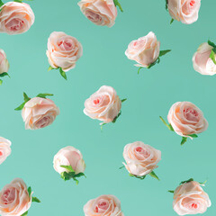 Roses in delicate colors. Rose pattern. Flowers in motion. On pastel mint background.