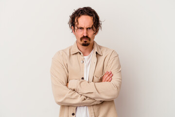 Fototapeta premium Young caucasian man isolated on white background blows cheeks, has tired expression. Facial expression concept.