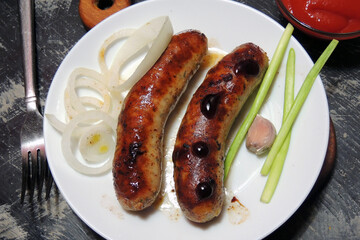 fried sausages with sauce