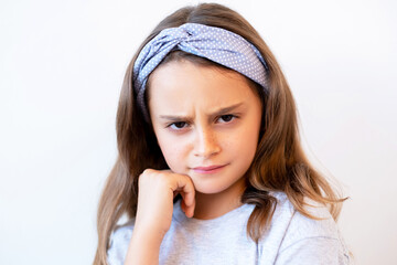 Offended kid portrait. Child punishment. Disobedience problem. Unhappy displeased skeptic stubborn...