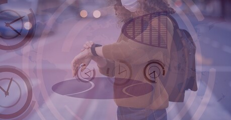 Mid-section of caucasian women looking at her watch with clock digital background