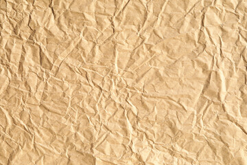 Old crumpled kraft paper background surface texture