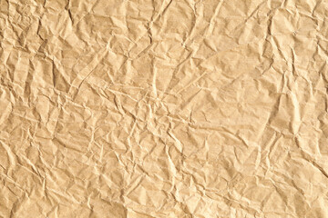 Old crumpled kraft paper background surface texture