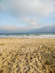 Fototapeta na wymiar empty sand beach and sea in winter