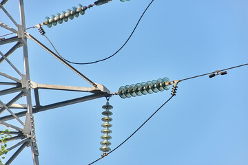 fragment of an electric pole with high-voltage wires