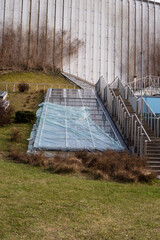 Facade glass on the building, sheltered from the rain with polyethylene