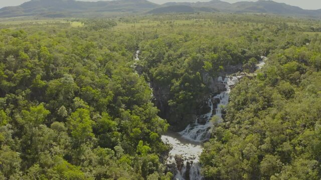 aerial image drone dji mavic 2 pro waterfall in the middle of the trees in Brazil Chapada dos Veadeiros