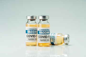 Covid 19 coronavirus vaccine in glass flask for immunity