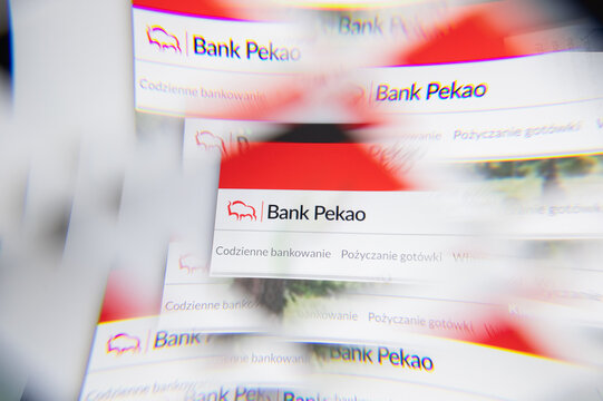 Milan, Italy - APRIL 10, 2021: Bank Pekao logo on laptop screen seen through an optical prism. Illustrative editorial image from Bank Pekao website.