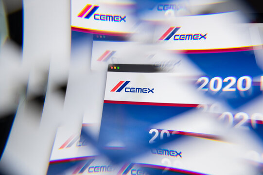 Milan, Italy - APRIL 10, 2021: Cemex logo on laptop screen seen through an optical prism. Illustrative editorial image from Cemex website.