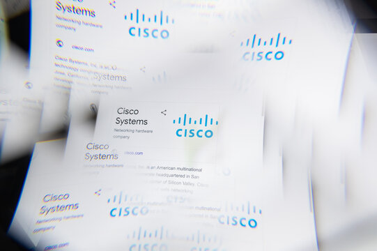 Milan, Italy - APRIL 10, 2021: Cisco Systems logo on laptop screen seen through an optical prism. Illustrative editorial image from Cisco Systems website.