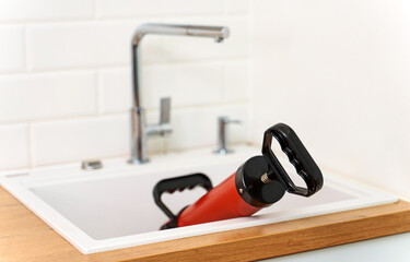 Professional force pump cleaner in the kitchen sink.