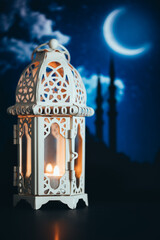 Ramadan Kareem greeting photo of beautiful Arabic lantern representing the Islamic Holy Month.  