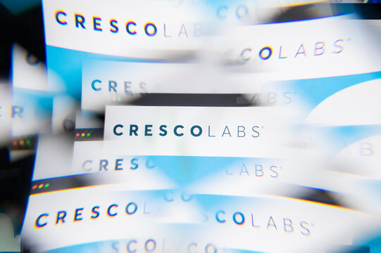 Milan, Italy - APRIL 10, 2021: Cresco Labs logo on laptop screen seen through an optical prism. Illustrative editorial image from Cresco Labs website.