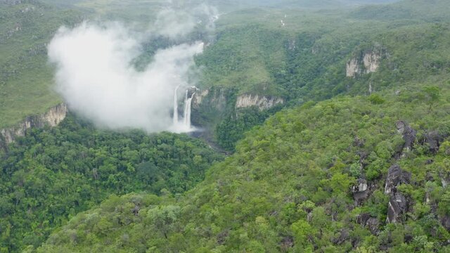 aerial image with drone dji mavic 2 pro of waterfall with fog in Chapada do veadeiros national park