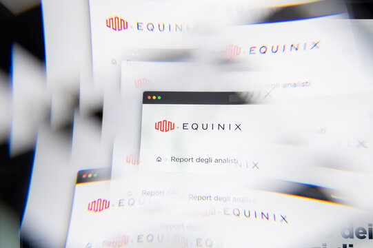 Milan, Italy - APRIL 10, 2021: Equinix logo on laptop screen seen through an optical prism. Illustrative editorial image from Equinix website.