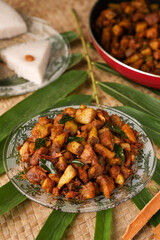 Kerala pork curry homemade Pork roast with Indian spices , spicy meat curry , meat stir fry mutton curry  Sri Lankan Goa non-vegetarian side dish Appam, Parotta porotta in India. Chukhandar gosht. 