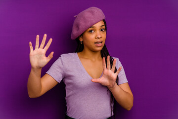 Young african american woman isolated on yellow background Young african american woman isolated on...
