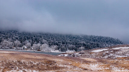 Scenic view of frost covered trees in the hills overlooking the prairies